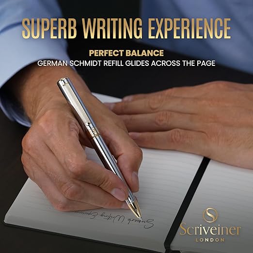 Professional using the Scriveiner London luxury ballpoint pen with smooth writing performance, silver chrome finish and gold trim.