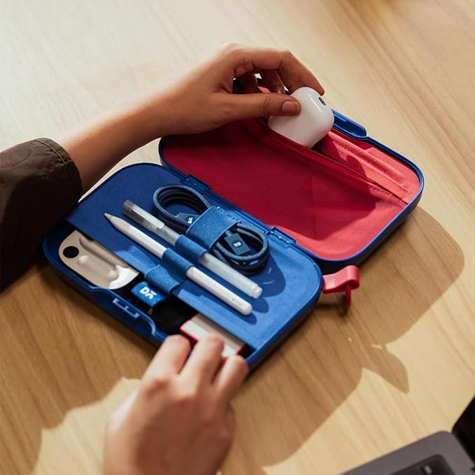 DailyObjects travel accessory organiser storing AirPods charging cable and accessories